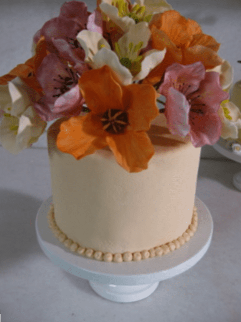 Poppy Topped Wedding Cake